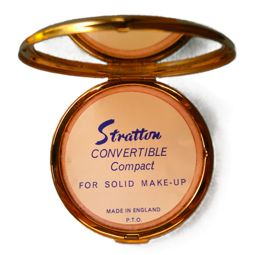 A Vintage Stratton Orange and White Flower Compact