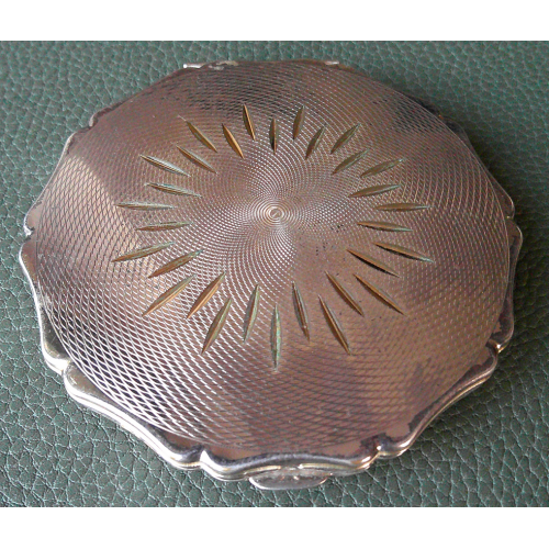 A Vintage Stratton Silver Coloured Compact