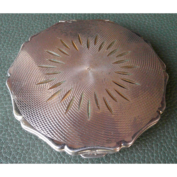 A Vintage Stratton Silver Coloured Compact