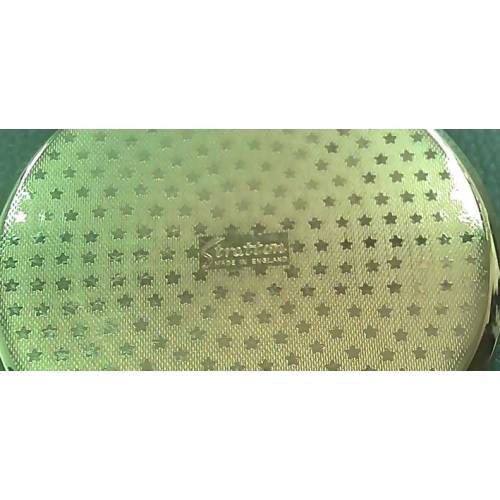 A Vintage Stratton Orange and White Flower Compact